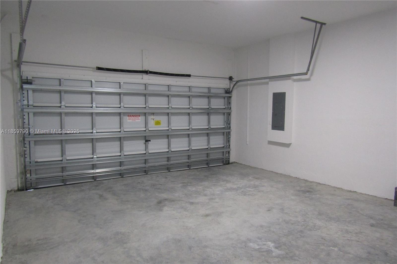 11998 Southwest 232nd Street Homestead, FL 33170 - Photo 22 of 30 a view of an empty garage