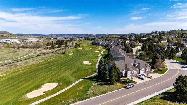 an aerial view of a house with swimming pool