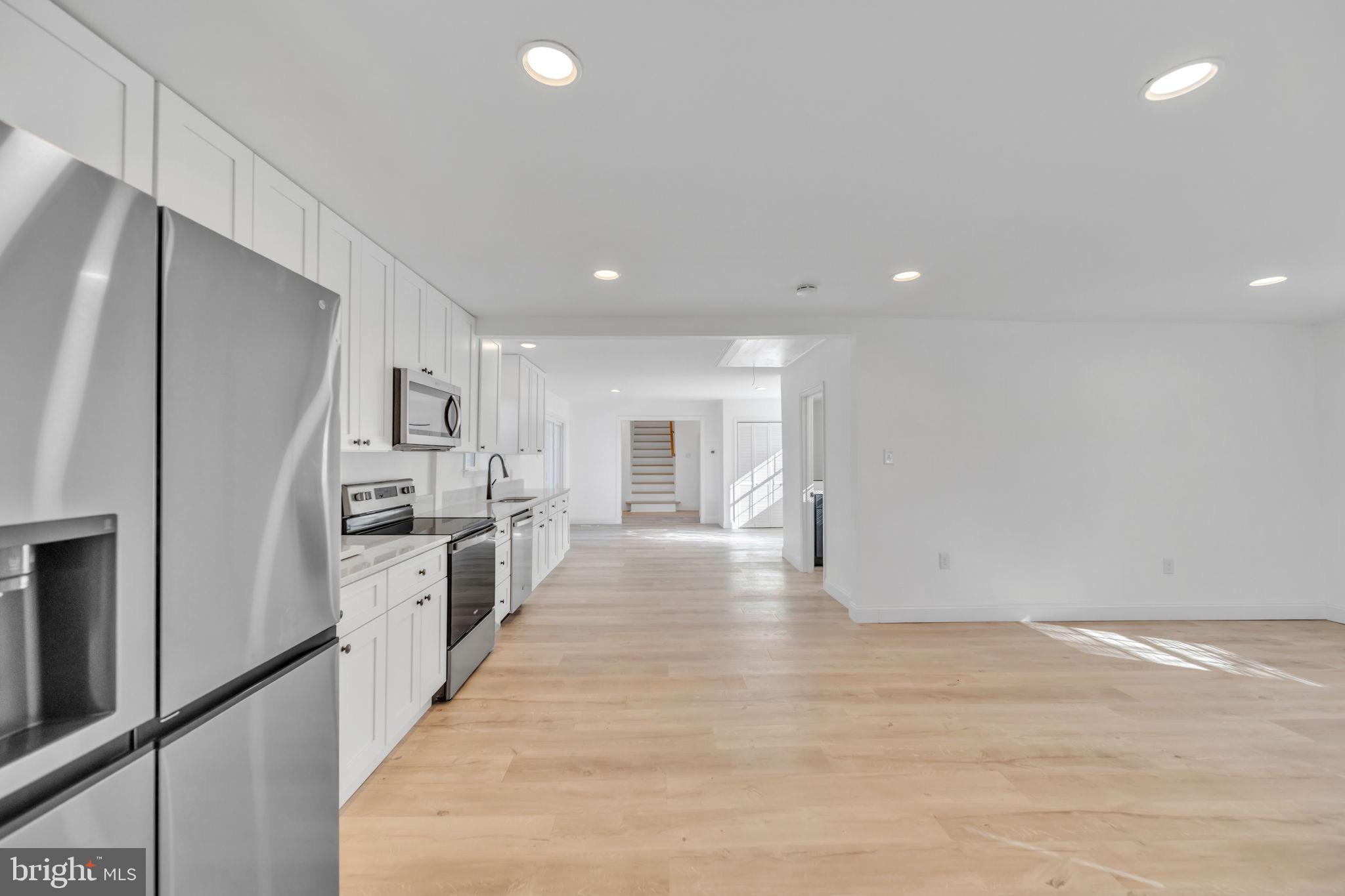 671 Pine Ridge Drive Front Royal, VA 22630 - Photo 45 of 108 Modern kitchen with open living space.
