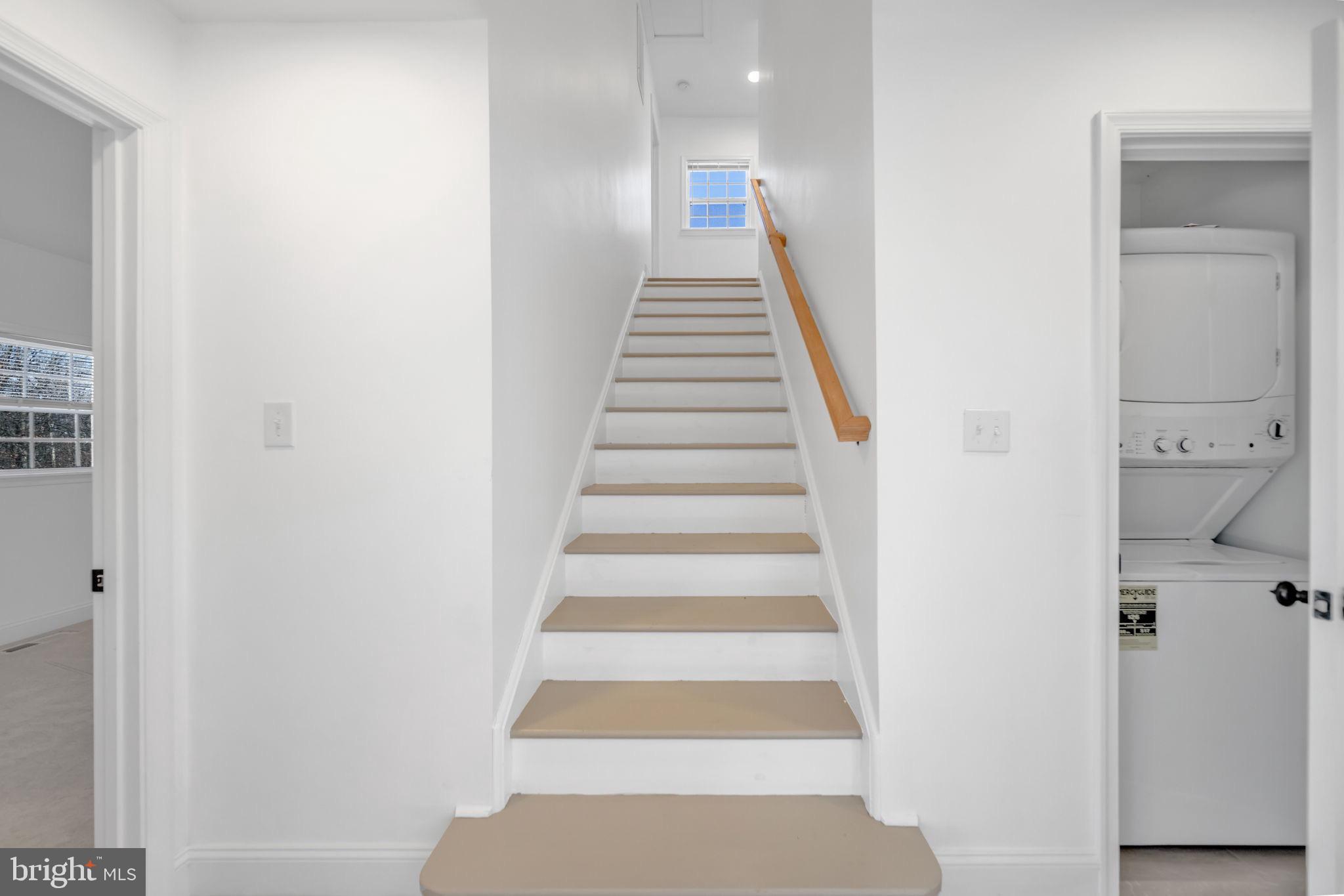 671 Pine Ridge Drive Front Royal, VA 22630 - Photo 54 of 108 Bright and inviting staircase to upper levels.