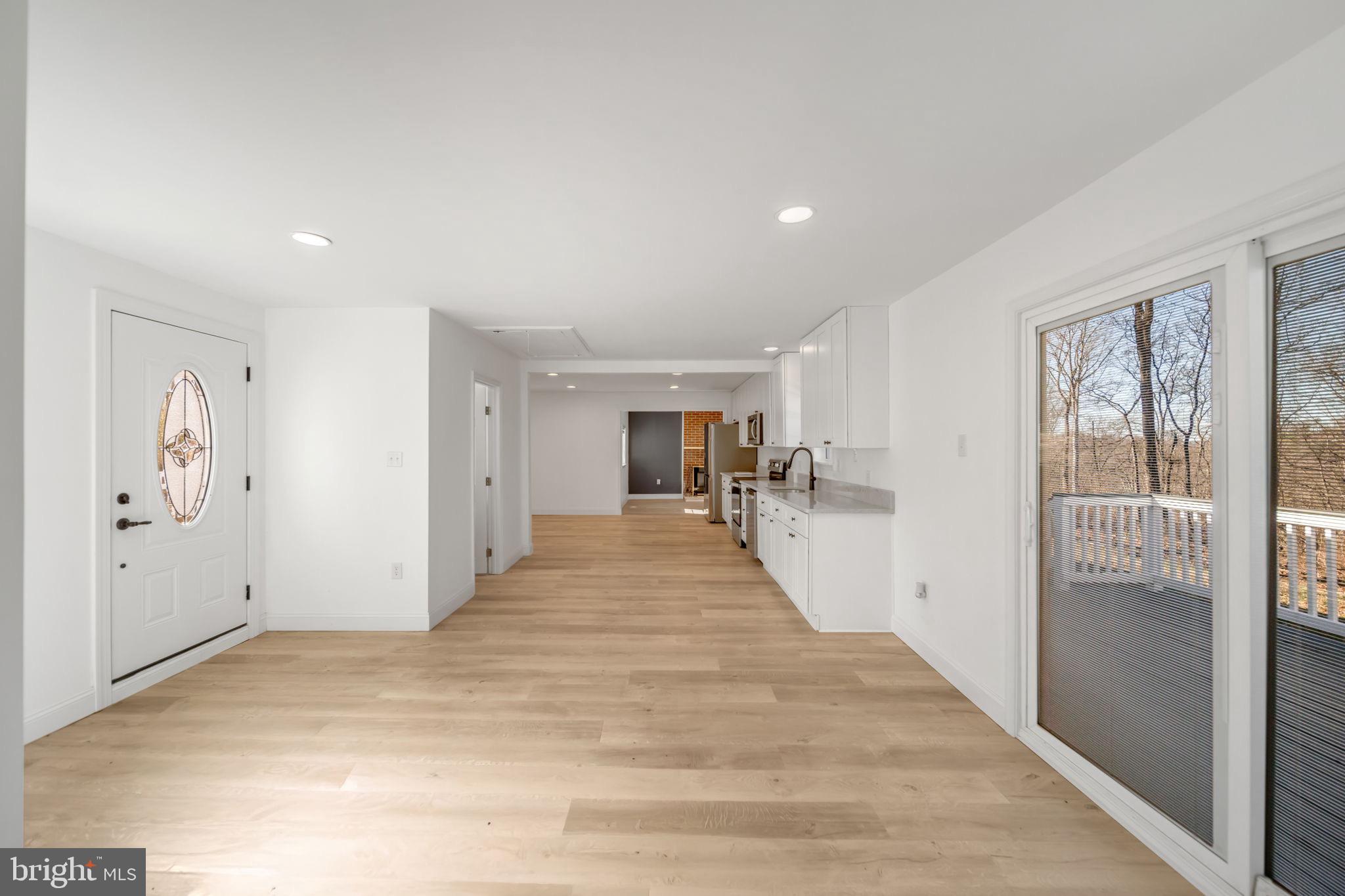 671 Pine Ridge Drive Front Royal, VA 22630 - Photo 67 of 108 Bright and airy open-concept living space.