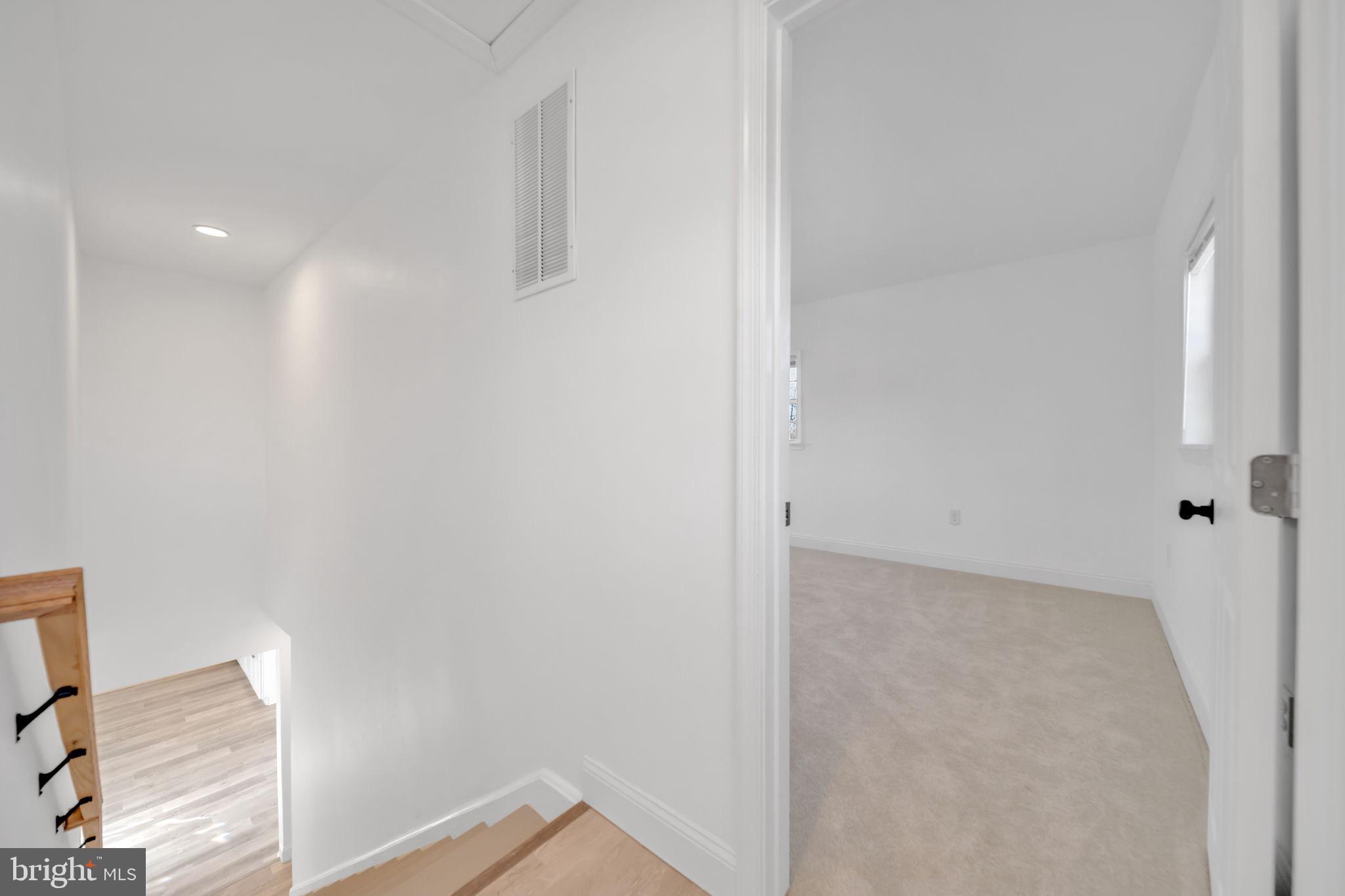 671 Pine Ridge Drive Front Royal, VA 22630 - Photo 69 of 108 Bright and airy hallway invites exploration.