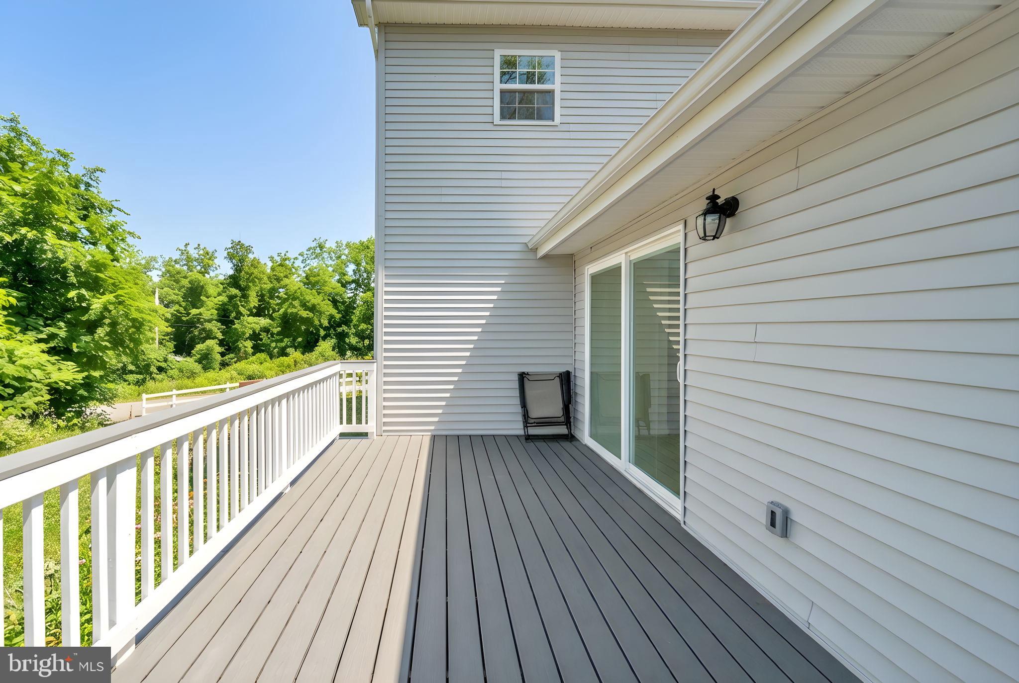 671 Pine Ridge Drive Front Royal, VA 22630 - Photo 9 of 108 Sunny deck with serene green views.