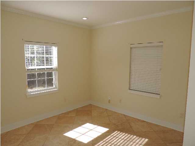 1102 East Nursery Road Santa Rosa Beach, FL 32459 - Photo 5 of 11 an empty room with a window