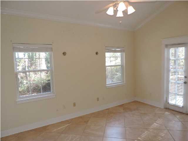 1102 East Nursery Road Santa Rosa Beach, FL 32459 - Photo 7 of 11 an empty room that has a window