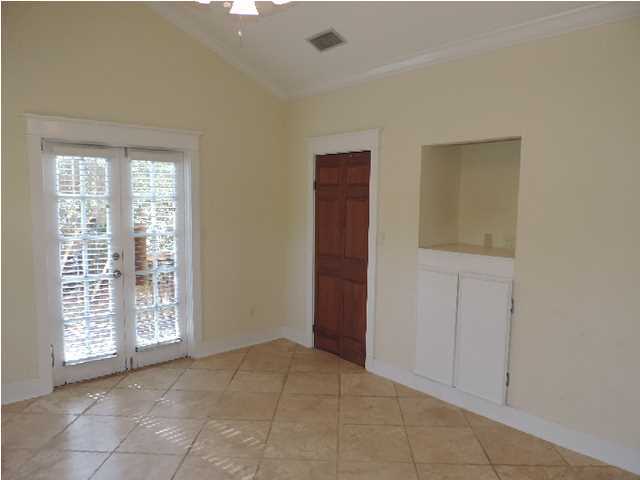 1102 East Nursery Road Santa Rosa Beach, FL 32459 - Photo 8 of 11 a view of an empty room with a window