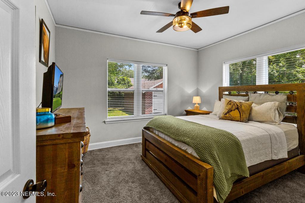 4635 Attleboro Street Jacksonville, FL 32205 - Photo 16 of 27 a bedroom with a bed and a window