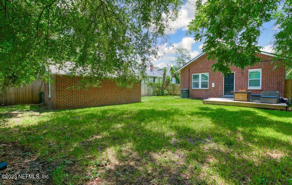 4635 Attleboro Street Jacksonville, FL 32205 - Photo 24 of 27 a front view of house with yard and green space