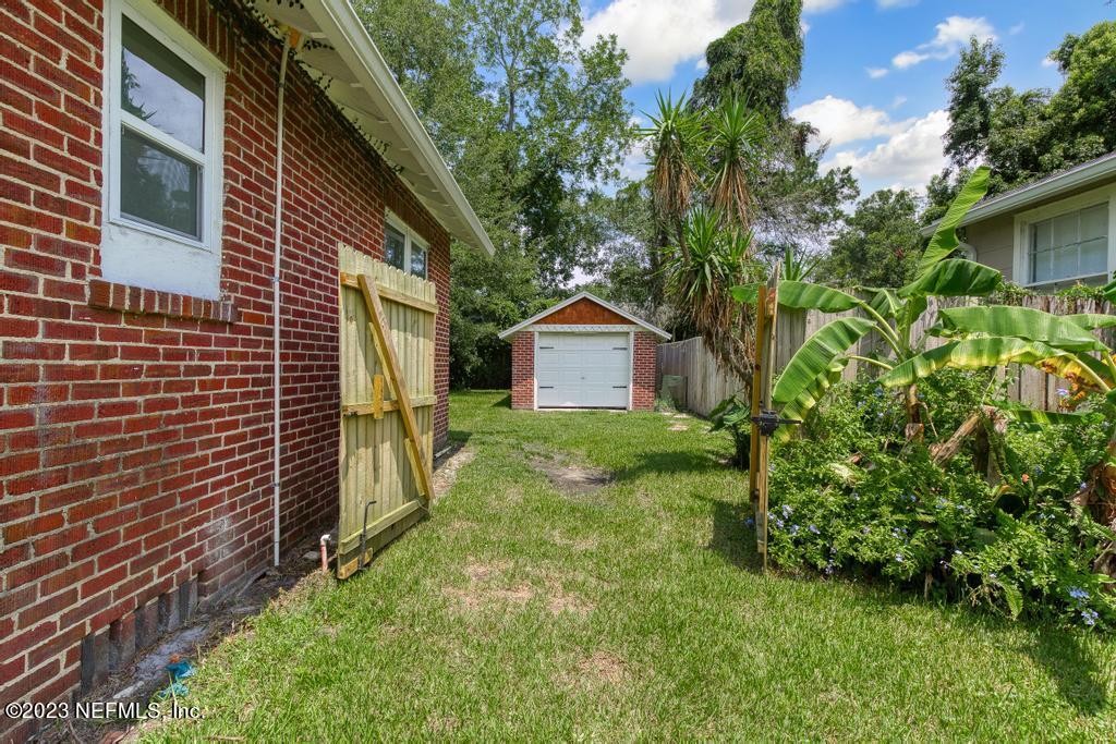4635 Attleboro Street Jacksonville, FL 32205 - Photo 27 of 27 a view of a house with a yard