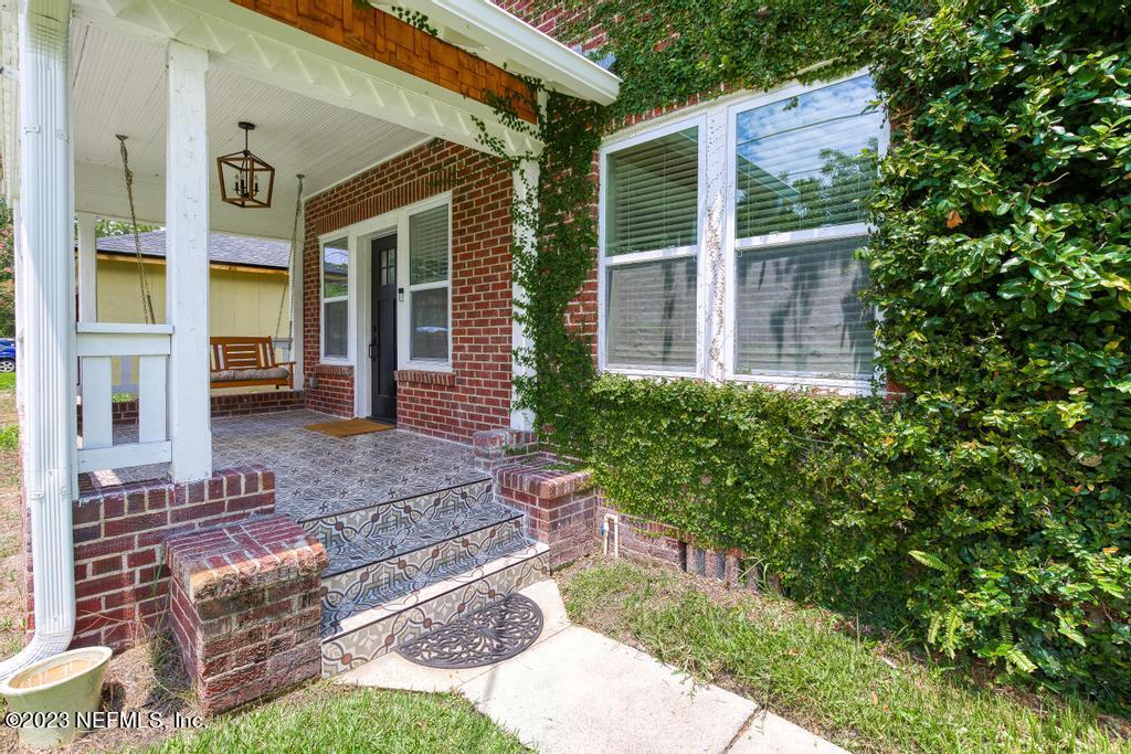 4635 Attleboro Street Jacksonville, FL 32205 - Photo 4 of 27 front view of a house with a yard