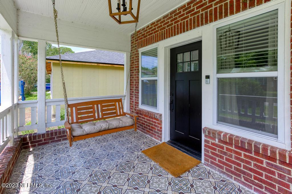 4635 Attleboro Street Jacksonville, FL 32205 - Photo 5 of 27 a view of a two room with a door and windows