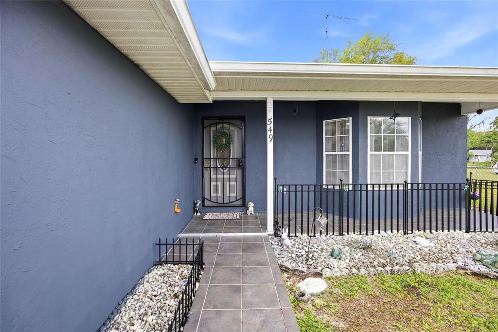 549 Silver Course Run Ocala, FL 34472 - Photo 3 of 48 a front view of a house