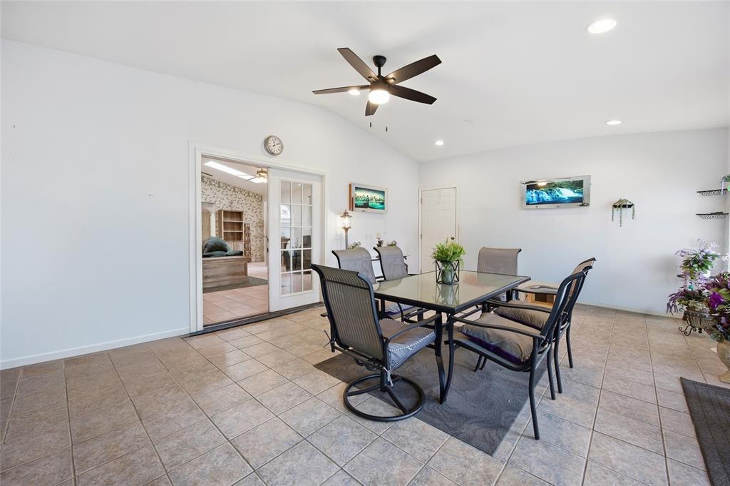 549 Silver Course Run Ocala, FL 34472 - Photo 32 of 48 a dining room with furniture and window