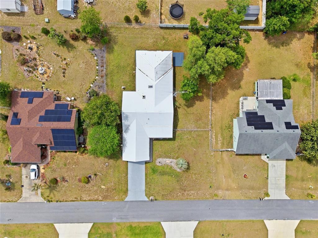 549 Silver Course Run Ocala, FL 34472 - Photo 41 of 48 an aerial view of residential houses with outdoor space