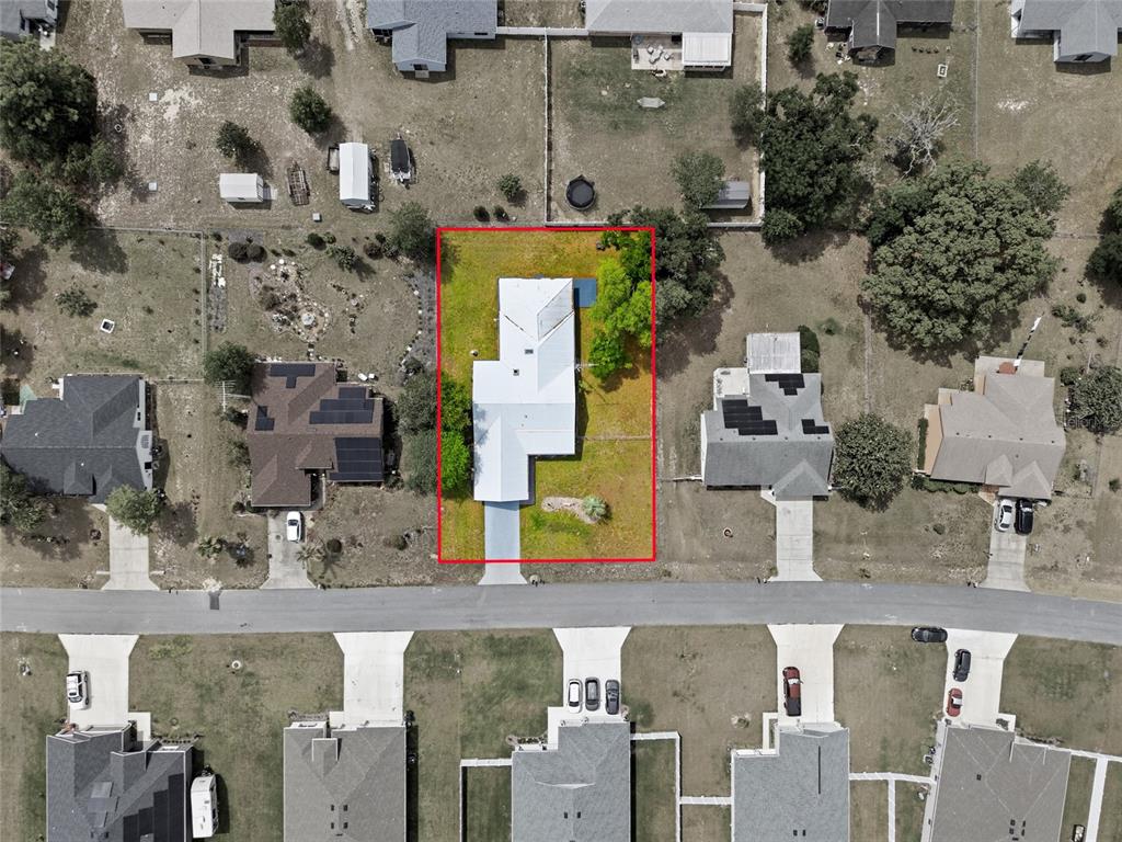 549 Silver Course Run Ocala, FL 34472 - Photo 42 of 48 an aerial view of residential houses with outdoor space