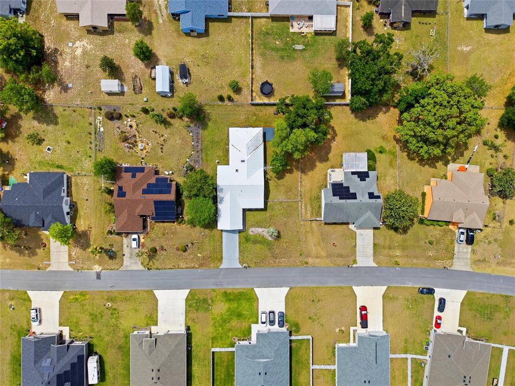 549 Silver Course Run Ocala, FL 34472 - Photo 43 of 48 an aerial view of residential houses with outdoor space