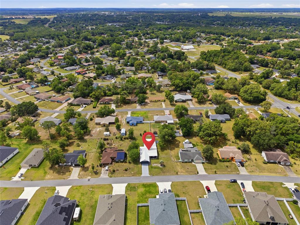 549 Silver Course Run Ocala, FL 34472 - Photo 44 of 48 an aerial view of residential houses with outdoor space
