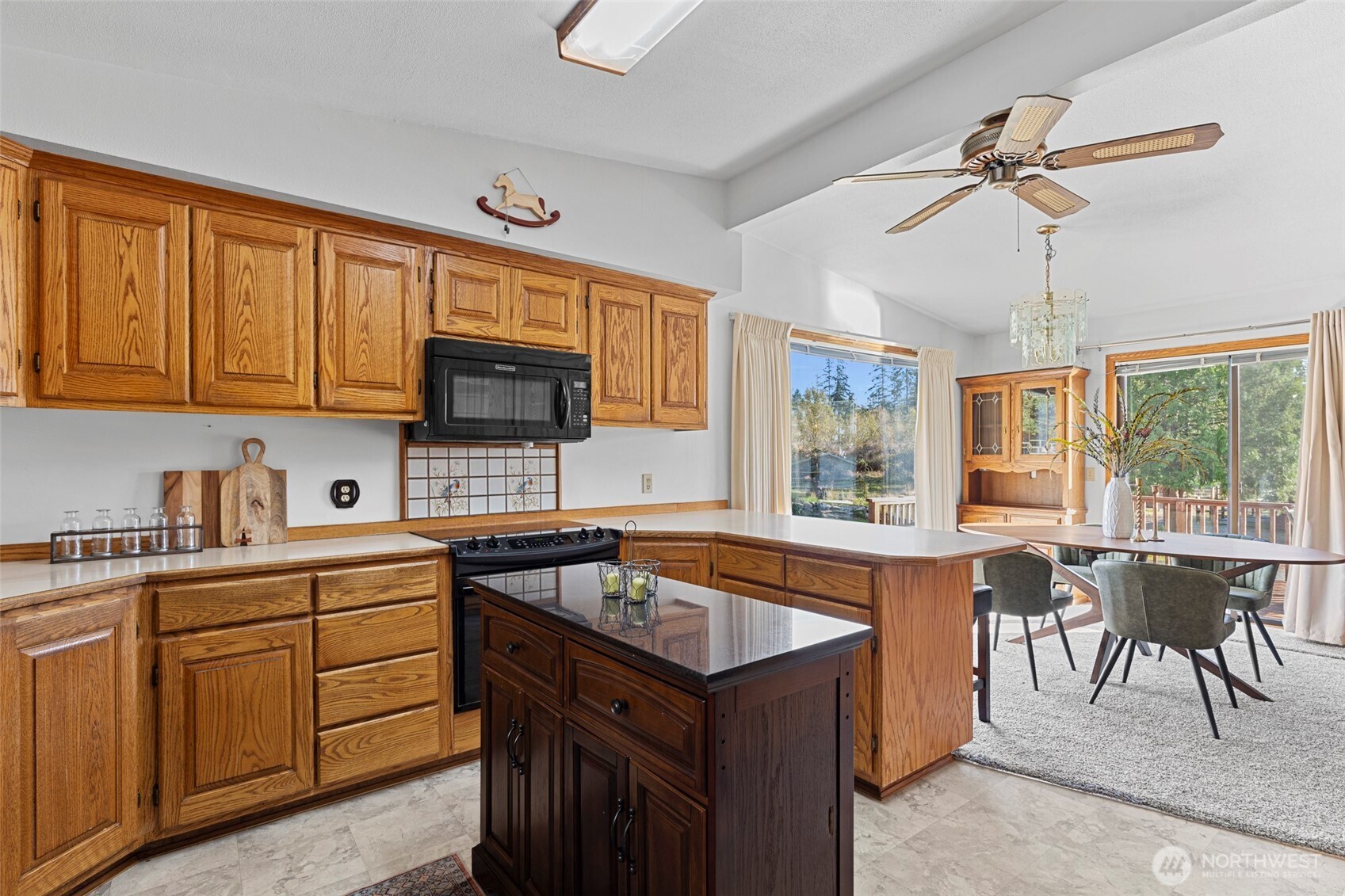 288 Torrence Lane Oak Harbor, WA 98277 - Photo 16 of 39 a kitchen with a sink stove and microwave