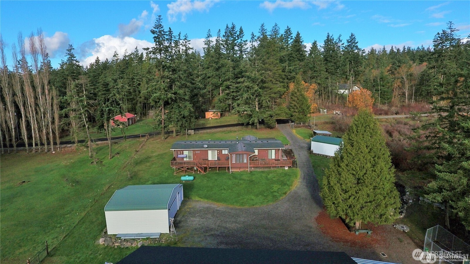 288 Torrence Lane Oak Harbor, WA 98277 - Photo 2 of 39 a view of a park with large trees