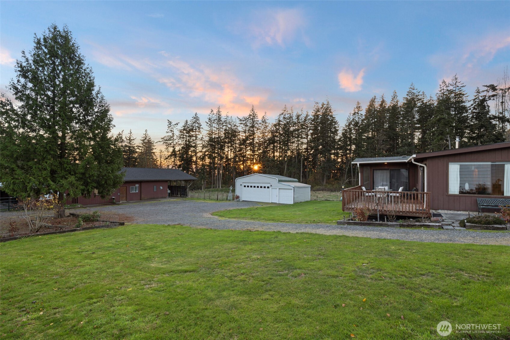 288 Torrence Lane Oak Harbor, WA 98277 - Photo 25 of 39 a house view with a sitting space and garden