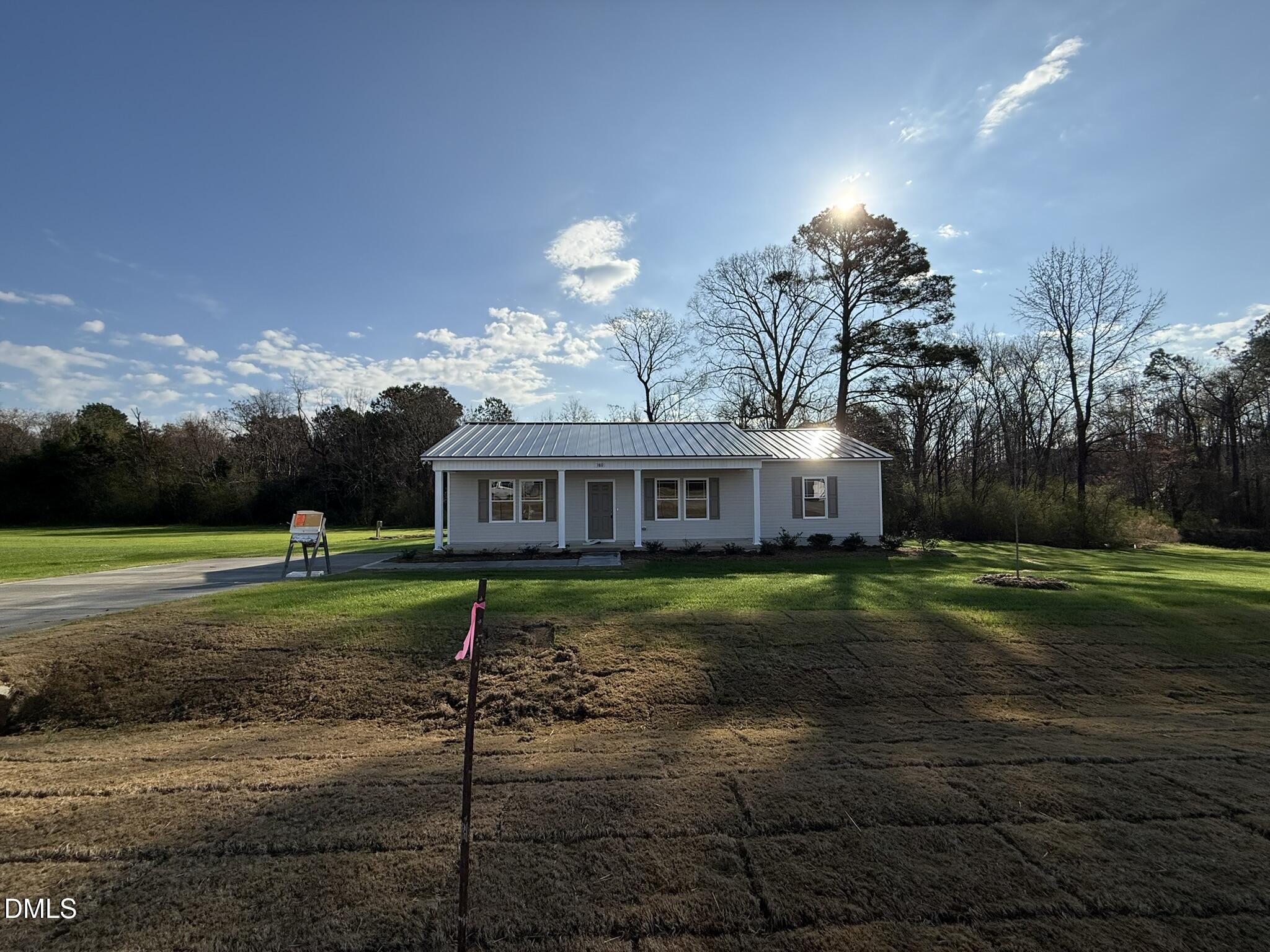 180 Jacobs Ridge Drive Four Oaks, NC 27524 - Photo 2 of 20 a view of a house with a yard