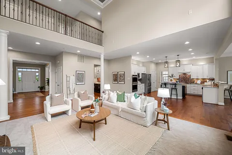 a kitchen with a sink a stove and cabinets