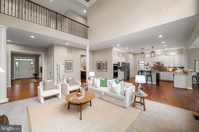 a kitchen with a sink a stove and cabinets