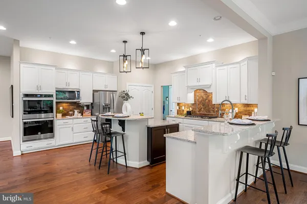 a bedroom with a large bed and a large window