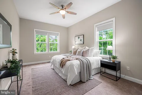 a bathroom with a sink double vanity and a mirror