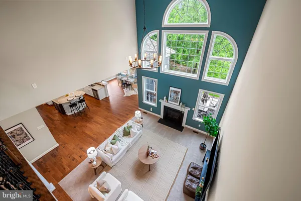 a bed room with bed and a large window