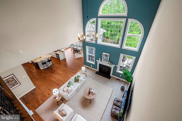 a bed room with bed and a large window