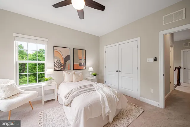 a bathroom with a tub shower and window