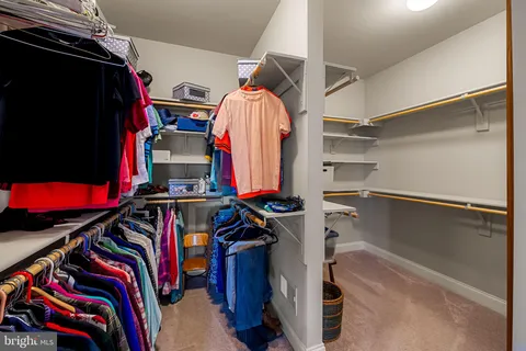 a view of a room with a wooden stairs