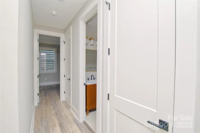 a bathroom with a tub and shower