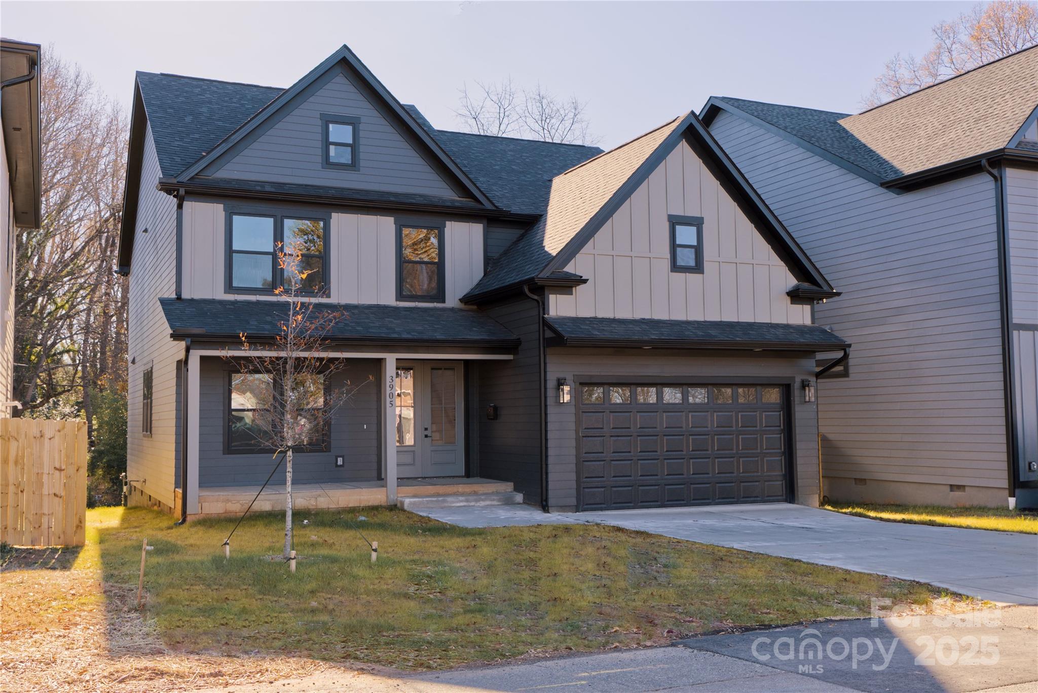 3905 Plainview Road Charlotte, NC 28208 - Photo 2 of 45 a front view of a house with a yard