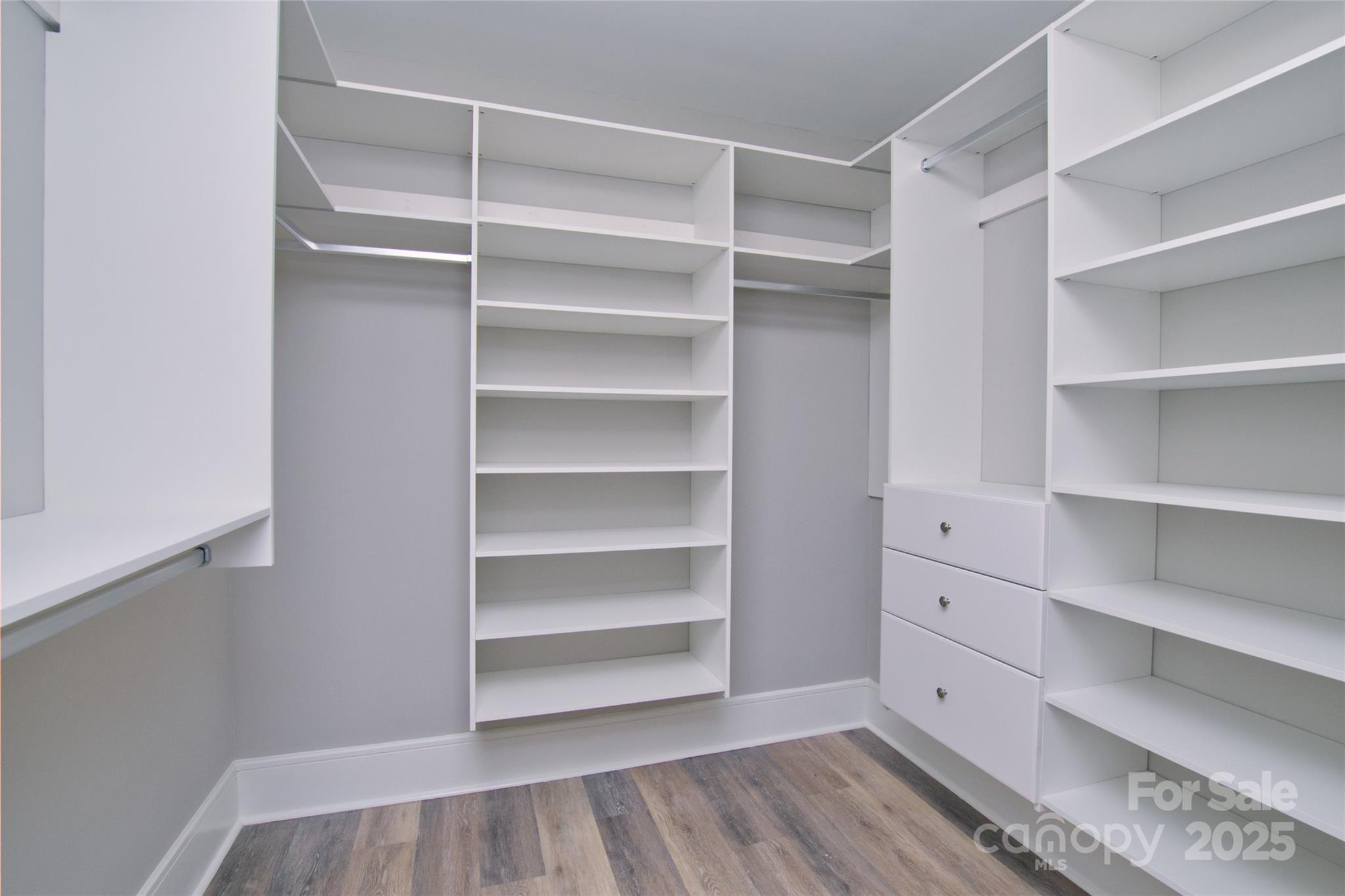 3905 Plainview Road Charlotte, NC 28208 - Photo 29 of 45 a view of walk in closet with empty racks