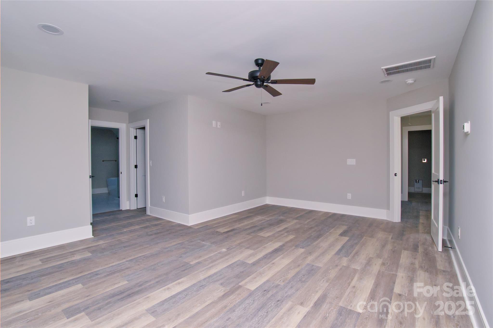 3905 Plainview Road Charlotte, NC 28208 - Photo 31 of 45 wooden floor in an empty room