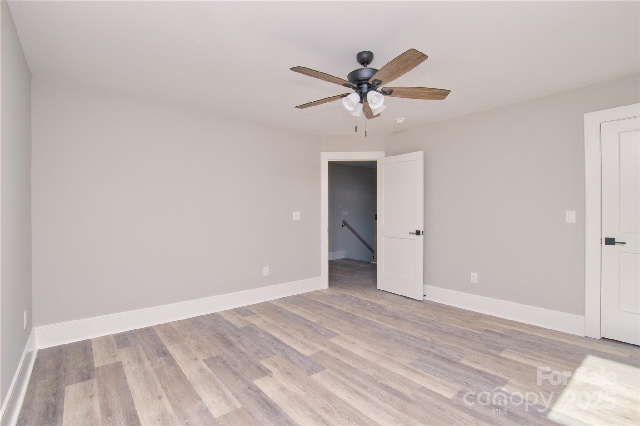 3905 Plainview Road Charlotte, NC 28208 - Photo 36 of 45 a view of a room with a sink and wooden floor