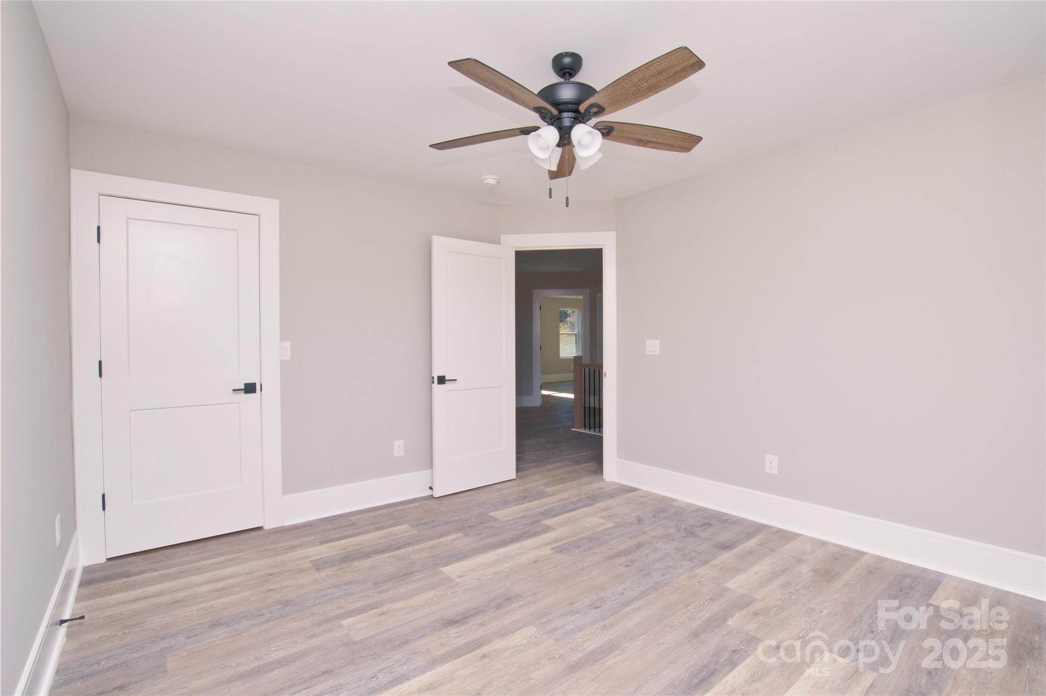 3905 Plainview Road Charlotte, NC 28208 - Photo 38 of 45 a view of a livingroom with a ceiling fan