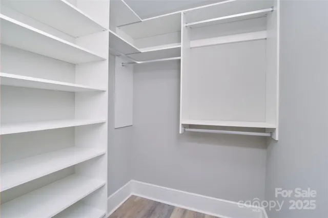 a view of an empty walk in closet