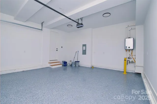 a view of a house with a barbeque