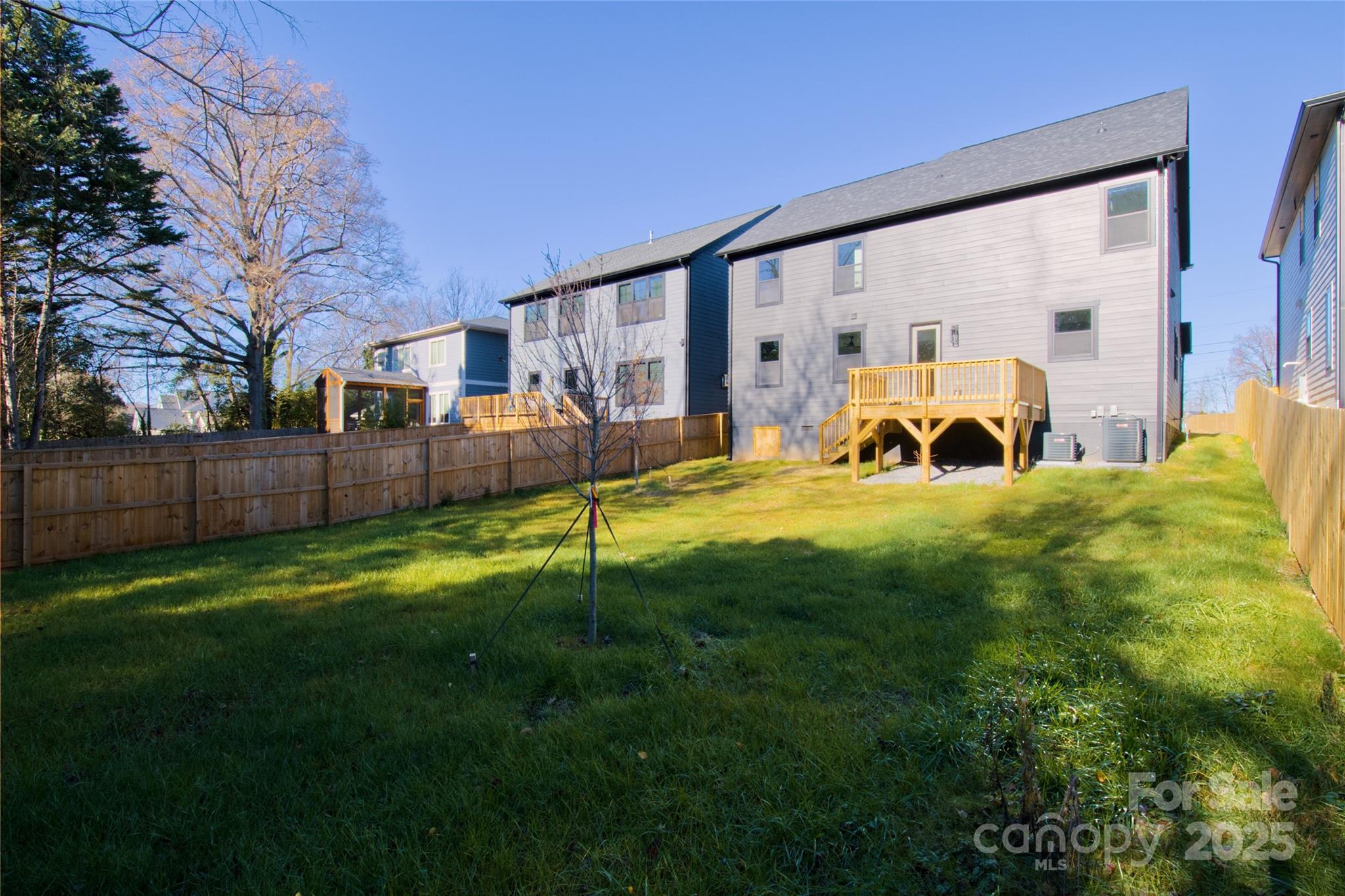 3905 Plainview Road Charlotte, NC 28208 - Photo 45 of 45 a view of yard with swimming pool and green space