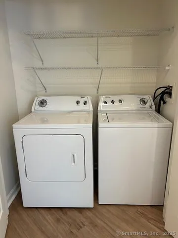 a utility room with dryer and washer