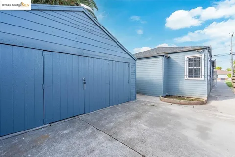 a view of a backyard of a house