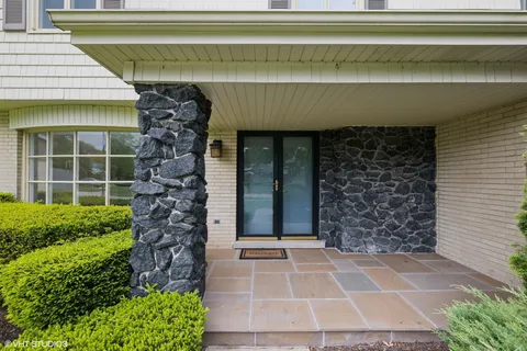 a front view of a house with a garage