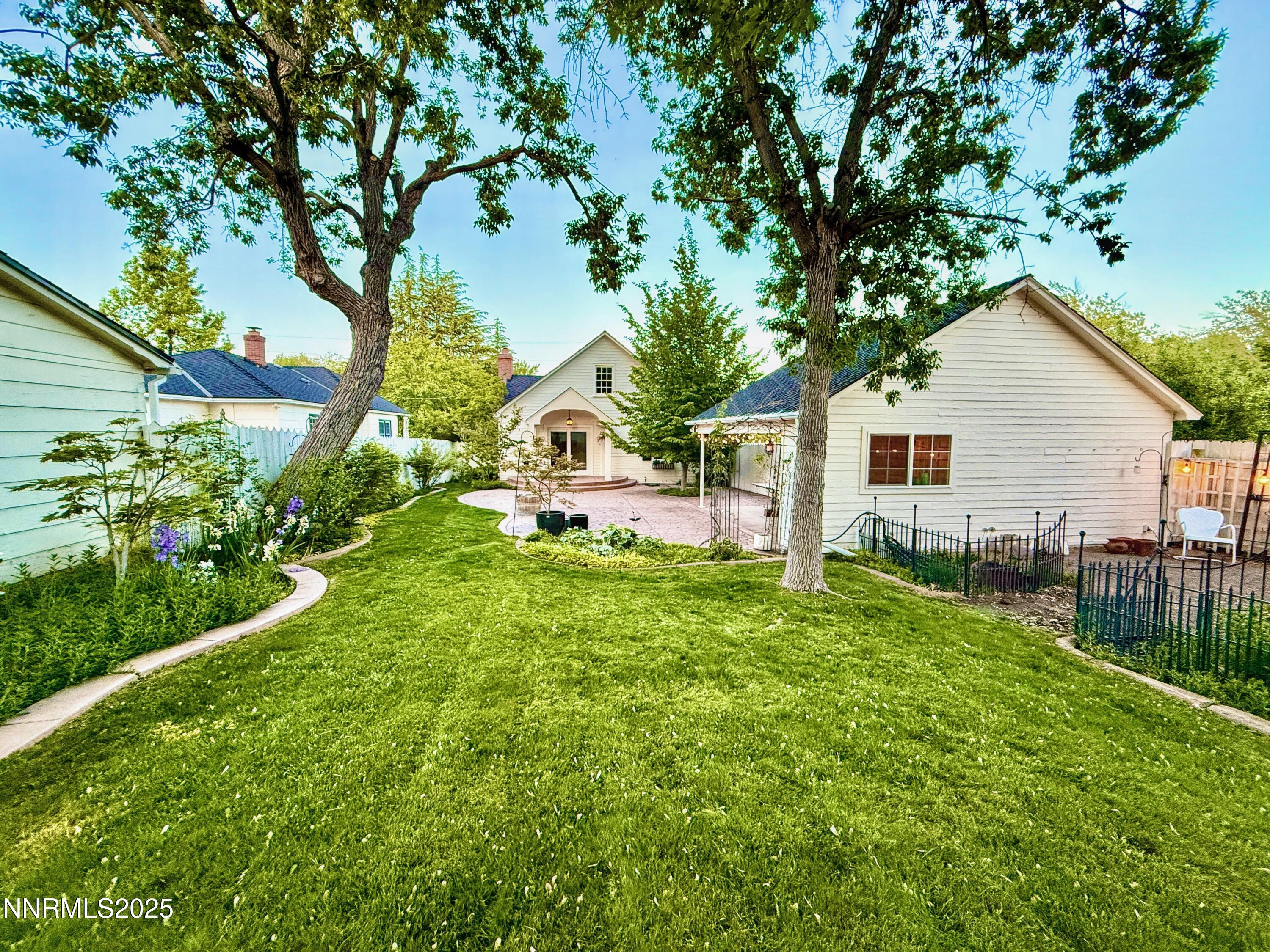 1423 Gordon Avenue Reno, NV 89509 - Photo 19 of 28 a view of a house with backyard and garden