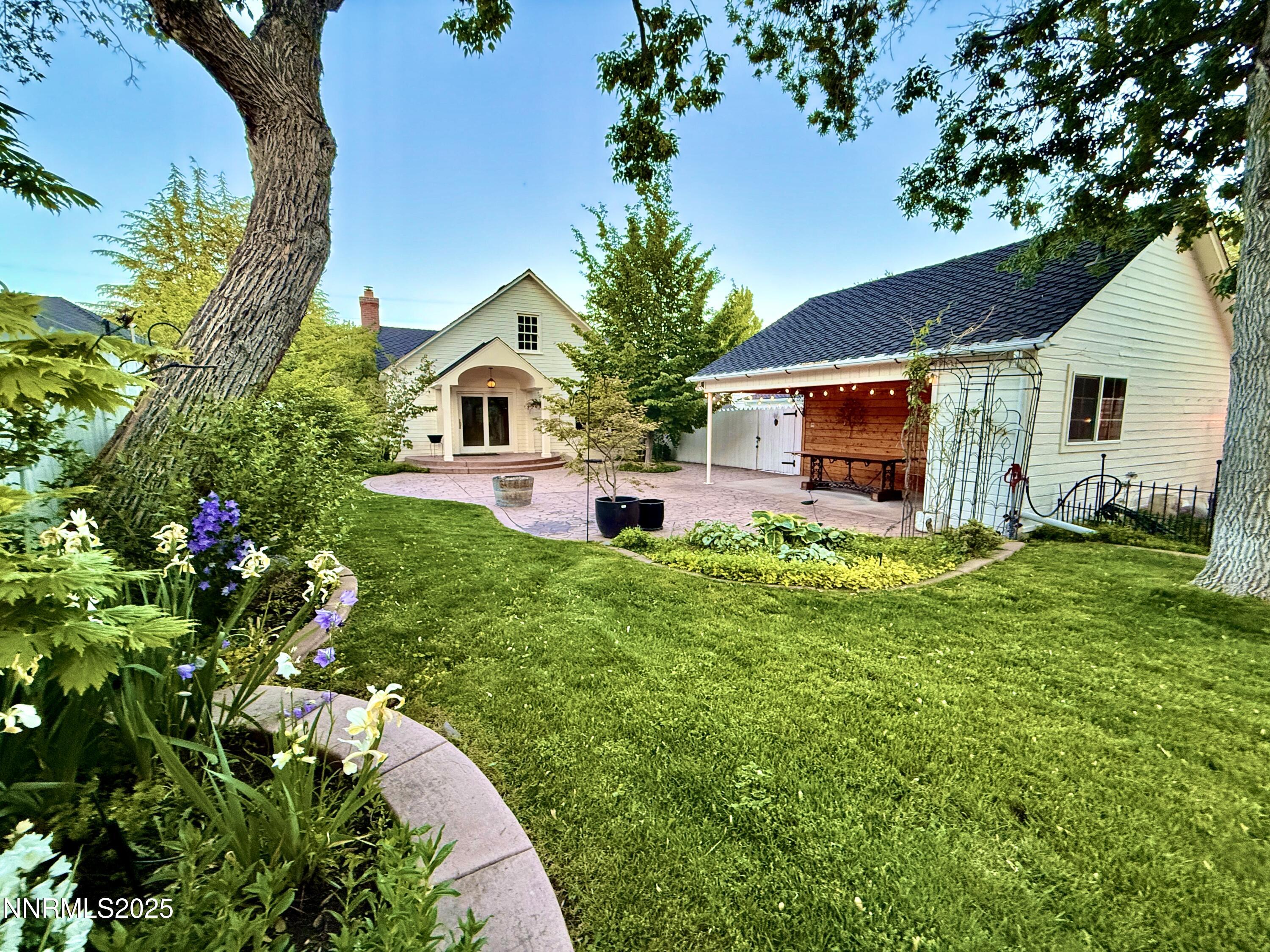 1423 Gordon Avenue Reno, NV 89509 - Photo 21 of 28 a view of a house with a backyard