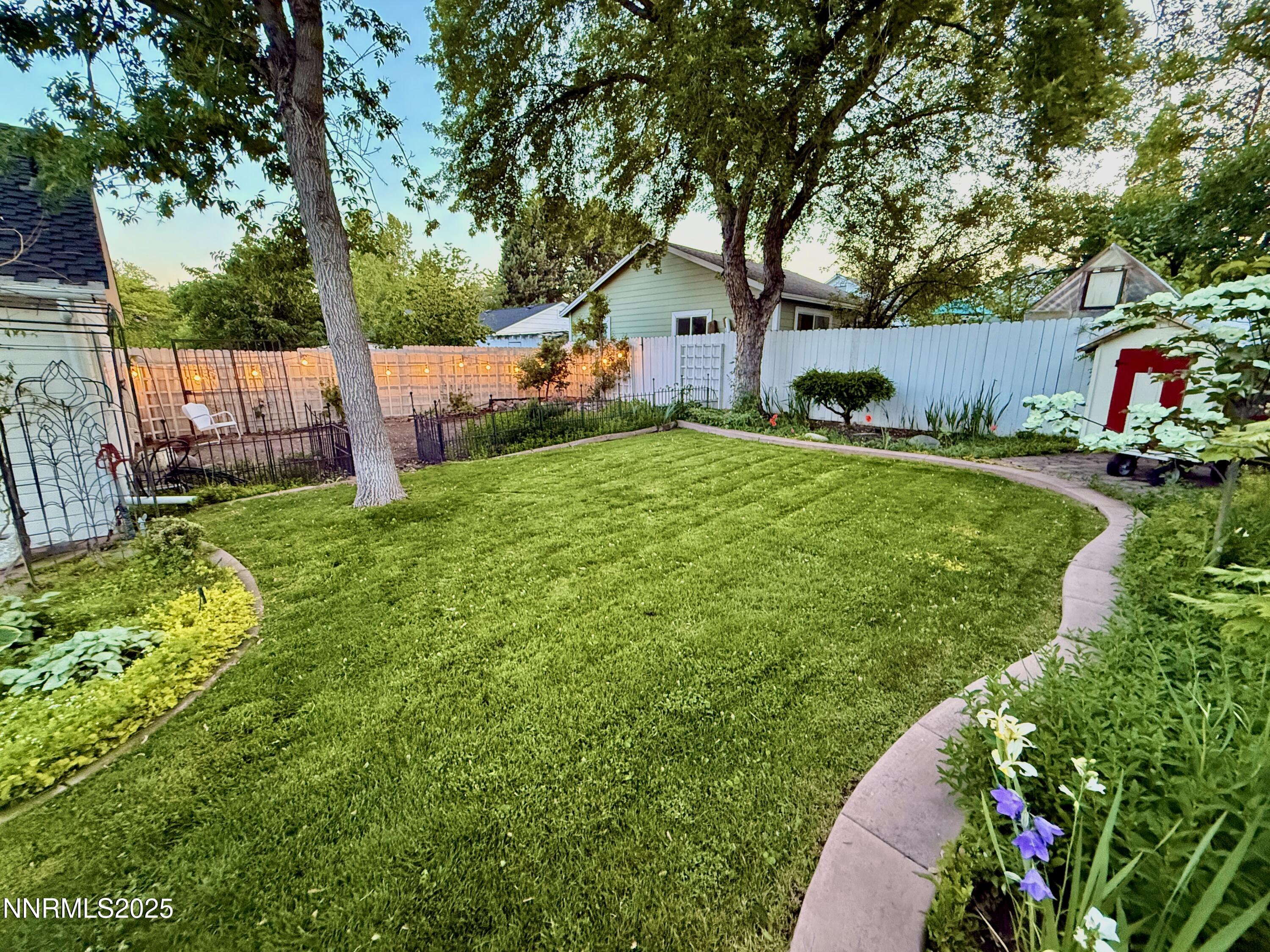 1423 Gordon Avenue Reno, NV 89509 - Photo 27 of 28 a view of a house with backyard and garden
