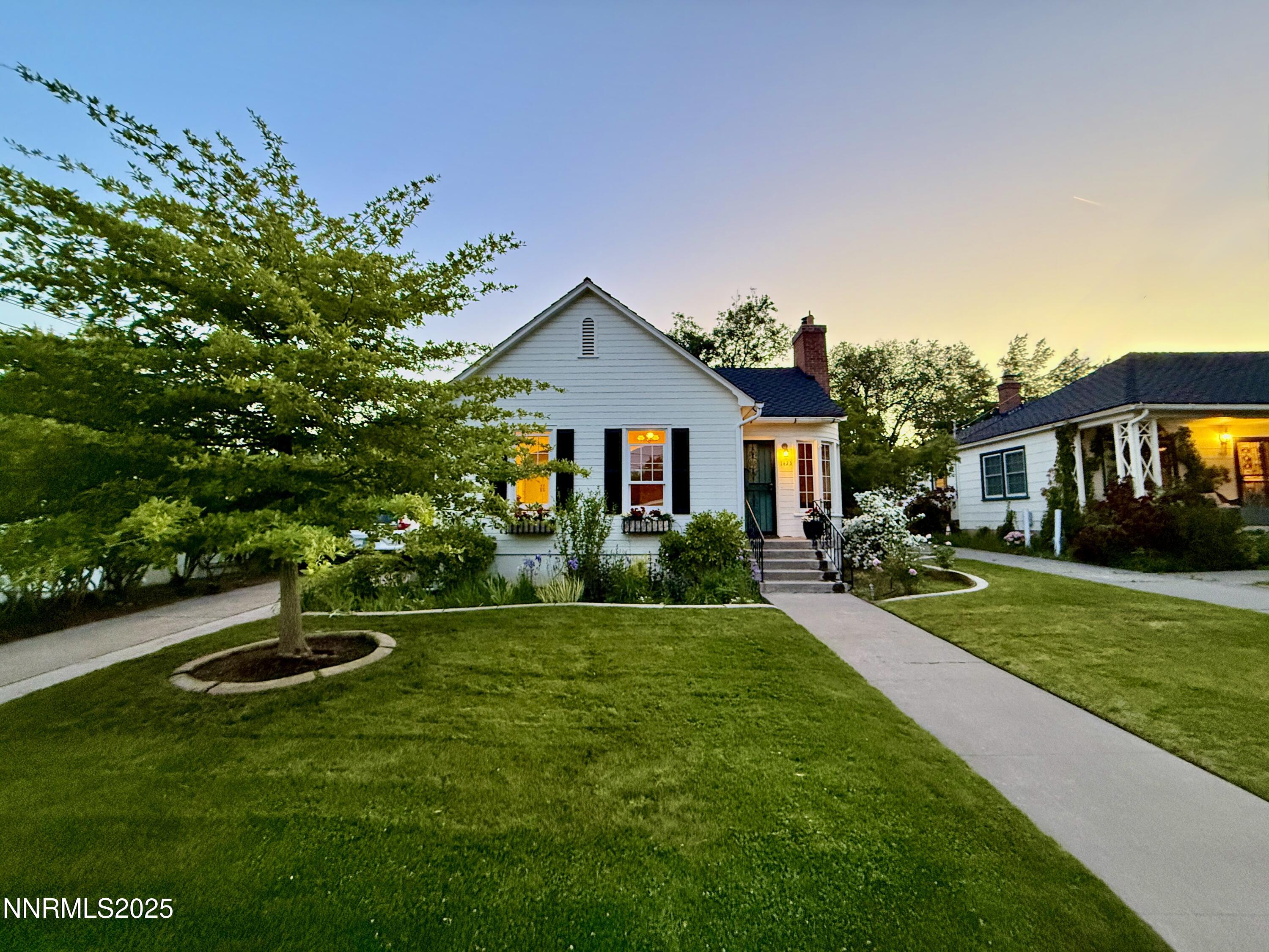 1423 Gordon Avenue Reno, NV 89509 - Photo 3 of 28 a front view of a house with garden