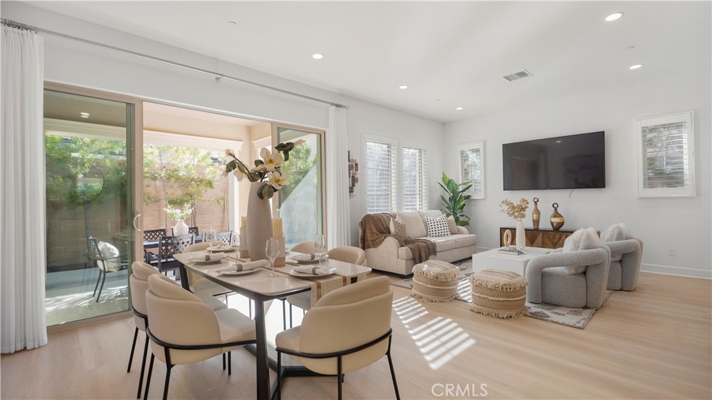 138 Jayhawk Irvine, CA 92602 - Photo 13 of 50 a living room with furniture and a flat screen tv